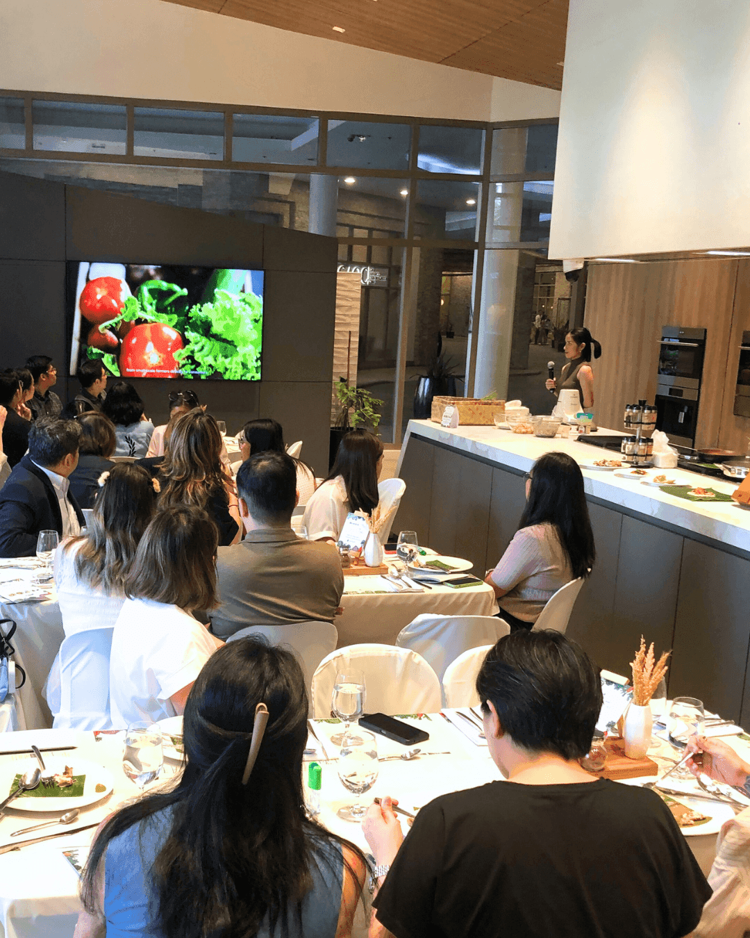 Chef Demonstrating Spiced Bulkan Banana Cake with Kalingag Cashew Mousse