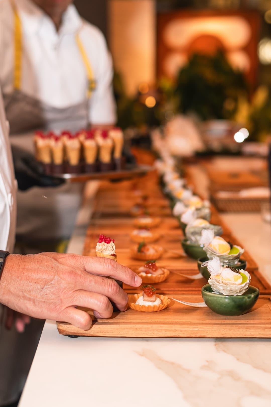 Chef Demonstrating Spiced Bulkan Banana Cake with Kalingag Cashew Mousse
