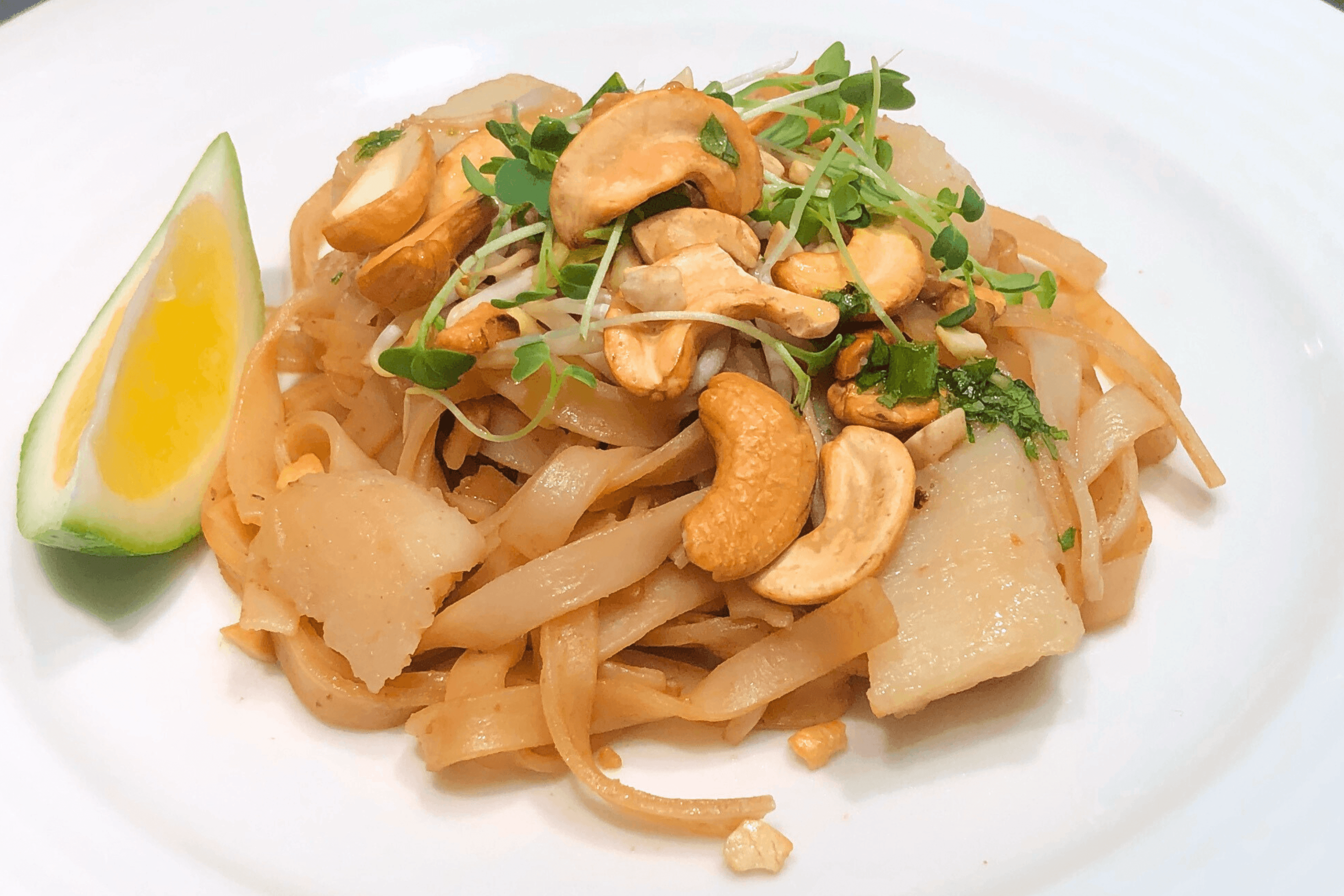 Scallop Pad Thai drizzled with Nam Jim sauce